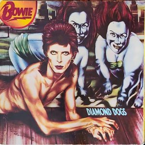DAVID BOWIE - DIAMOND DOGS RECORD (VG) SLEEVE (VG)